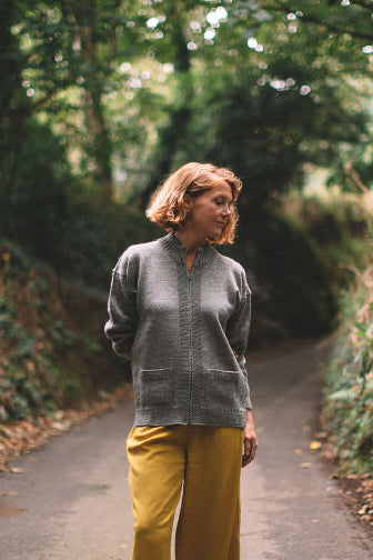 Mid Grey Zipped Guernsey Jacket on a wooden hanger