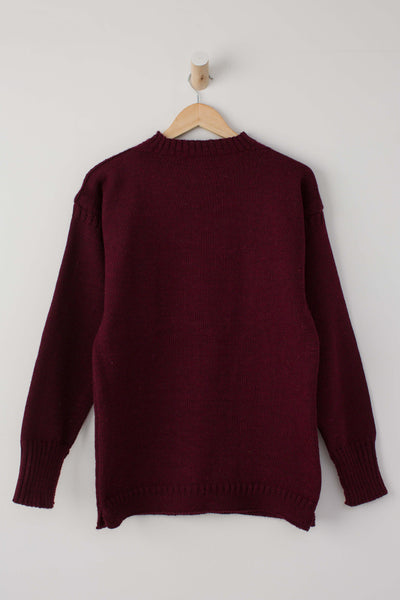 Burgundy Traditional Guernsey Jumper on a wooden hanger