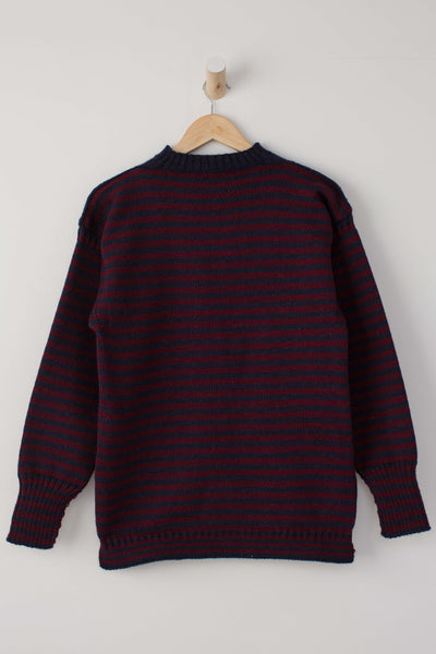 Navy & Burgundy Striped Traditional Guernsey Jumper on a wooden hanger