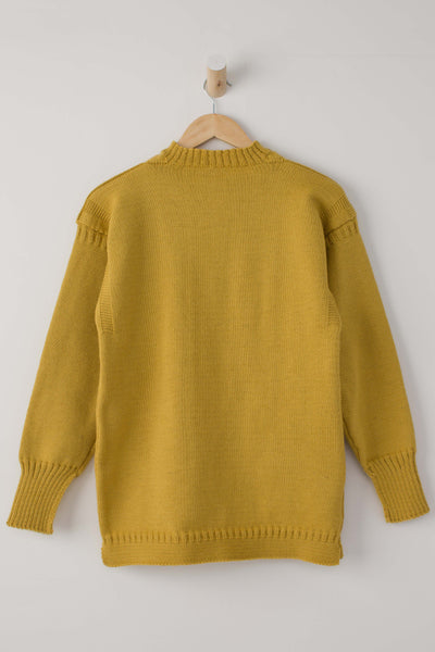 Mustard Traditional Guernsey Jumper on a wooden hanger