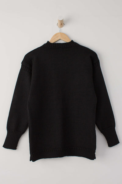 Black Traditional Guernsey Jumper on a wooden hanger