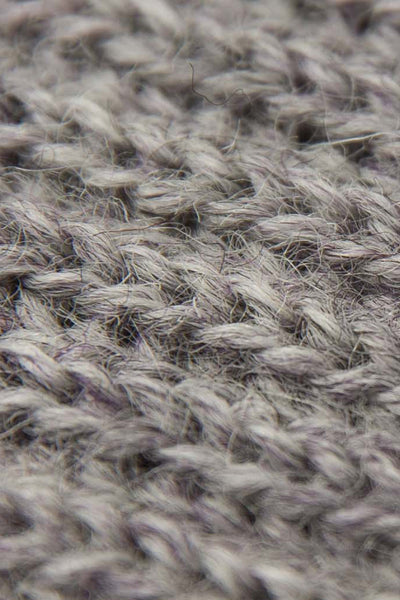 Rolled up Smoky Grey knitted scarf
