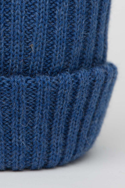 close up of mid blue beanie