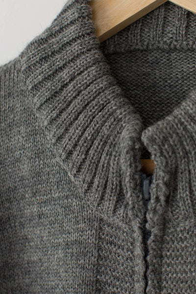 Mid Grey Zipped Guernsey Jacket on a wooden hanger