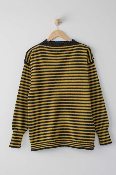 Charcoal & Mustard Striped Traditional Guernsey Jumper on a hanger