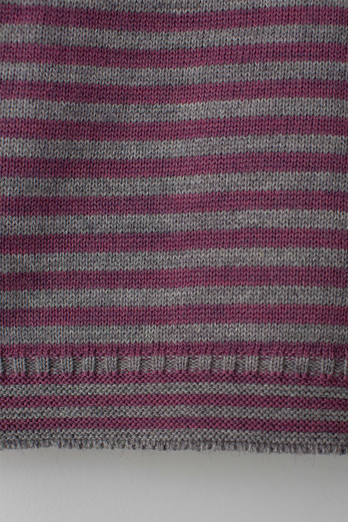 Hem detail on a Lupin Pink & Pale Grey Striped Traditional Guernsey