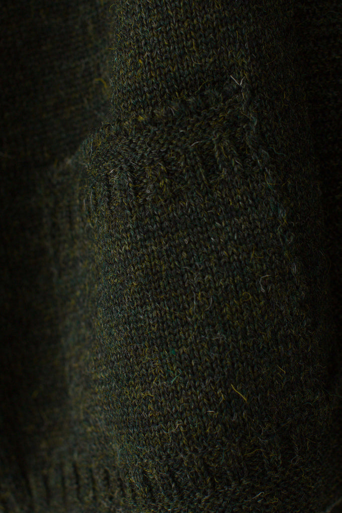 Pocket detail on a Military Green Zipped Guernsey Jacket