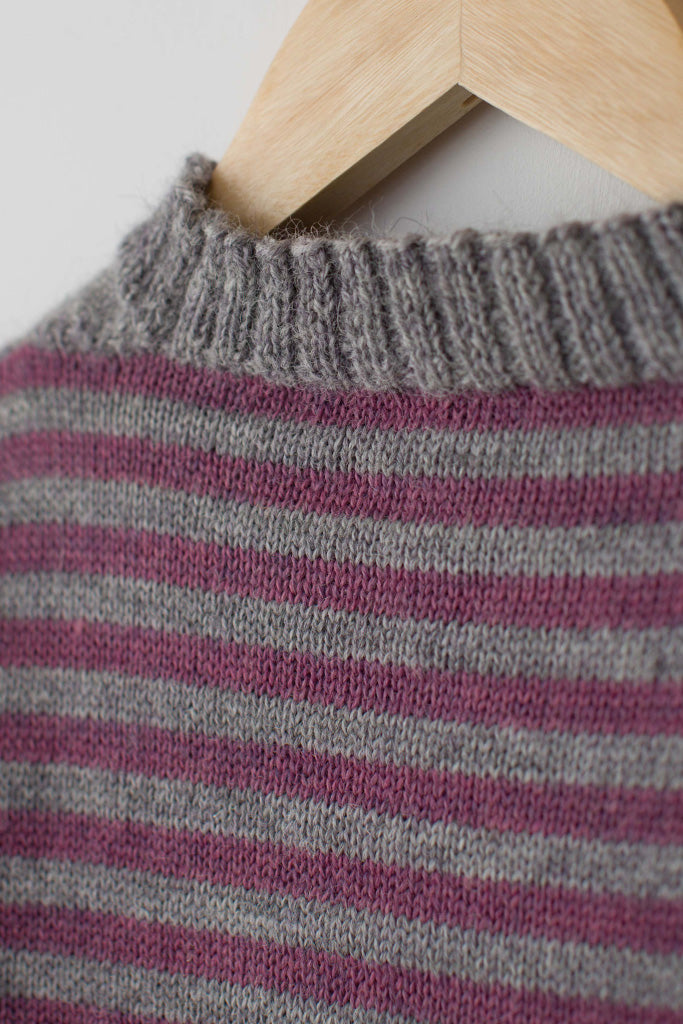 Neck detail on a Lupin Pink & Pale Grey Striped Traditional Guernsey