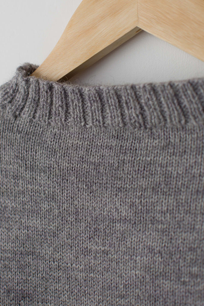 Neck detail on a light Grey Traditional Guernsey