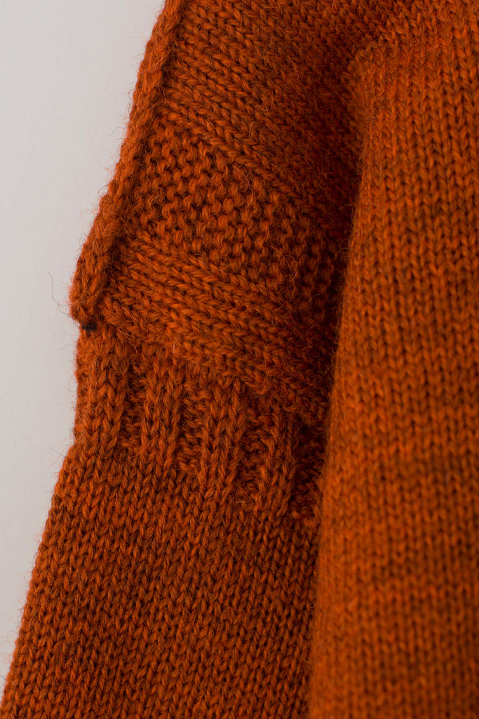 Sleeve detail on a Burnt Orange Traditional Guernsey