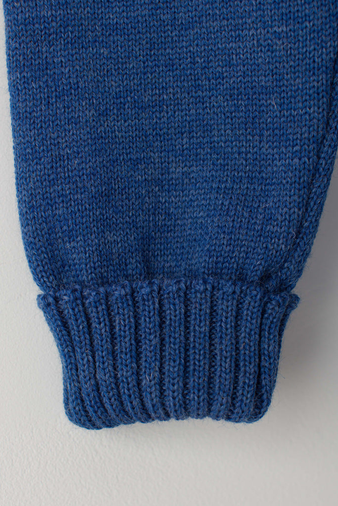 Folded cuff detail on a Indigo Blue Traditional Guernsey