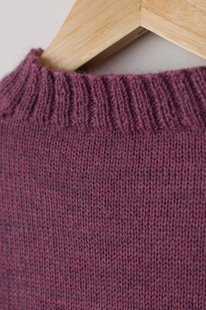 Neck detail on a Lupin Pink Traditional Guernsey