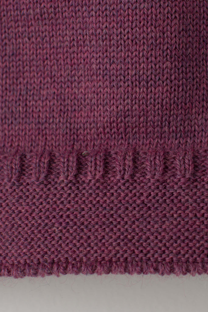 Hem detail on a Lupin Pink Traditional Guernsey