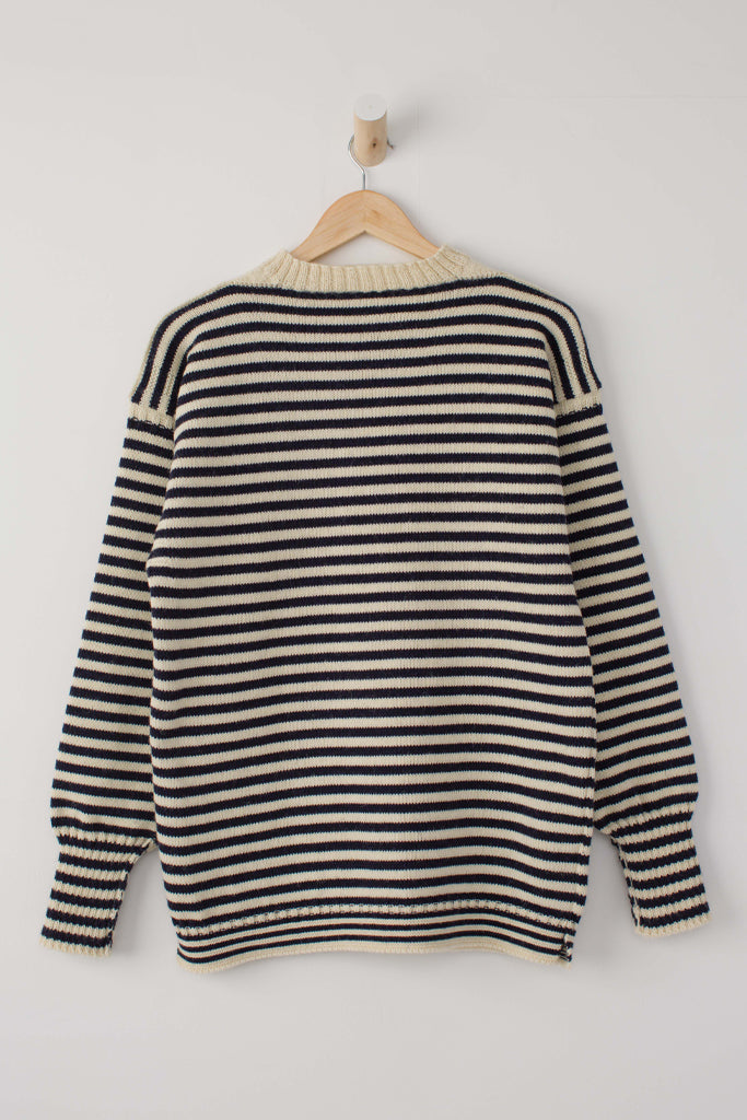 Cream & Navy Striped Traditional Guernsey Jumper on a wooden hanger