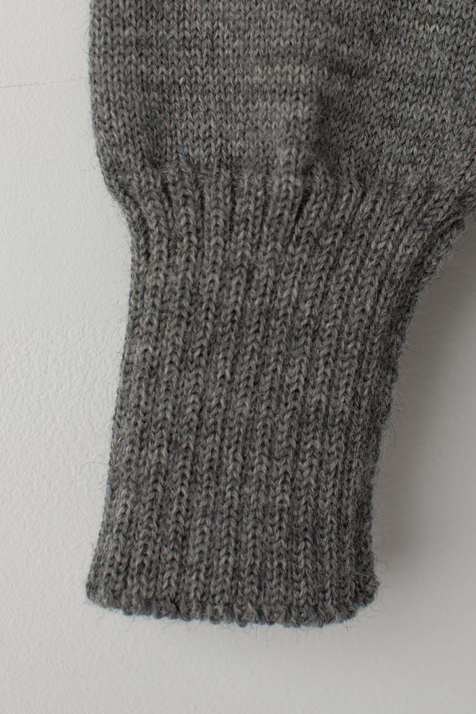 Open cuff detail on a Mid Grey Traditional Guernsey