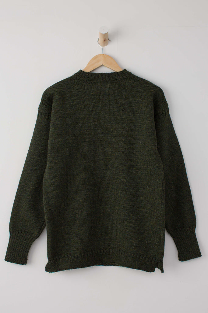 Military Green Traditional Guernsey Jumper on a wooden hanger