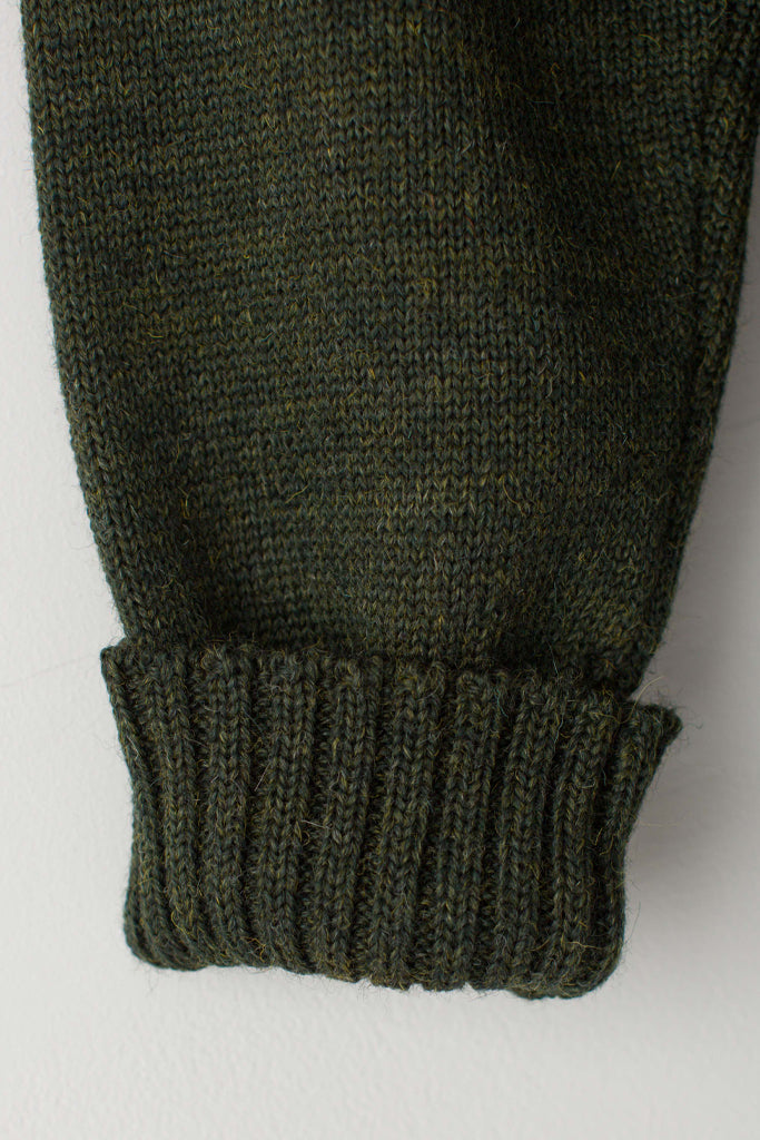 Folded cuff detail on a Military Green Traditional Guernsey