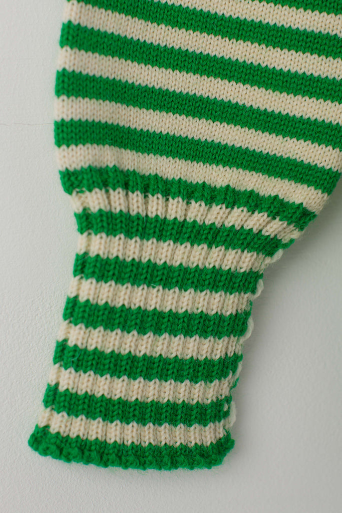 Open cuff detail on a Kelly Green & Aran Striped Traditional Guernsey