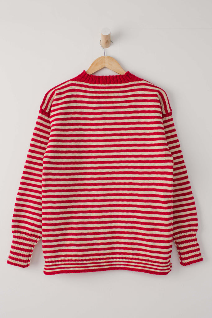 Red & Aran Striped Traditional Guernsey Jumper on a wooden hanger