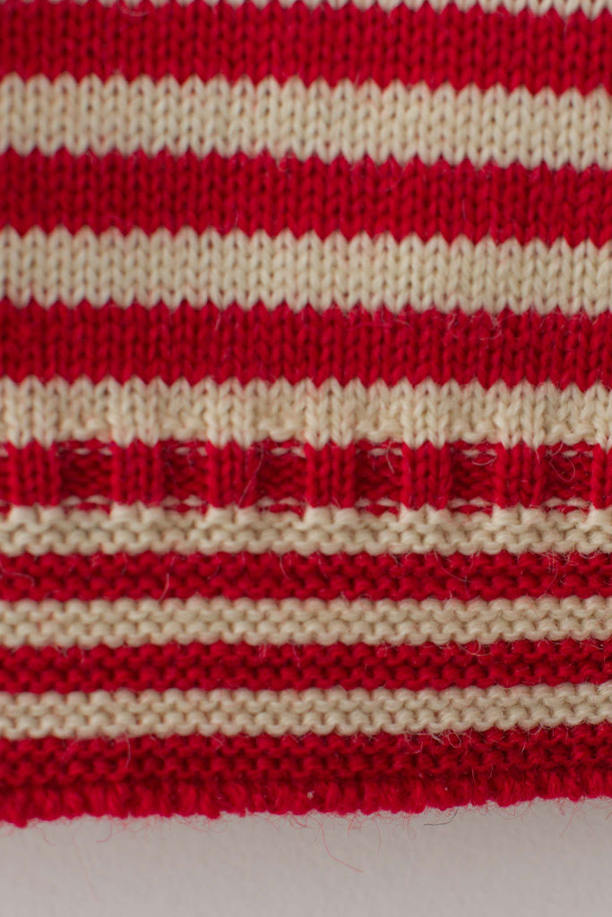 Hem detail on a Red & Aran Striped Traditional Guernsey
