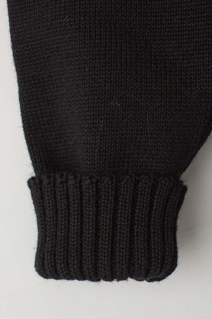 Folded Cuff detail of a traditional black guernsey