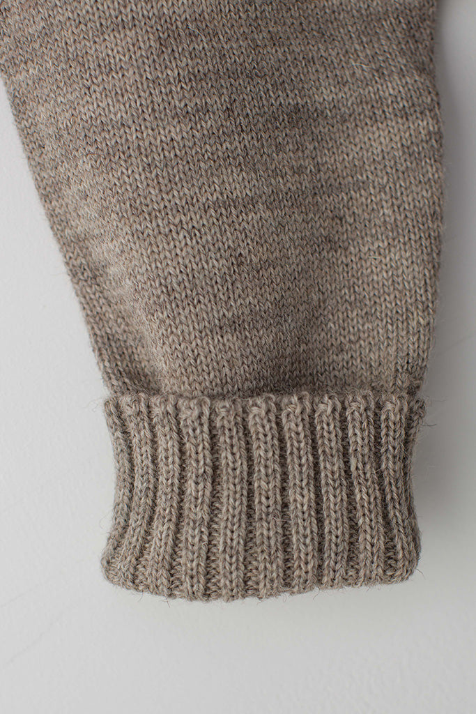 Folded cuff detail on a Beige Traditional Guernsey