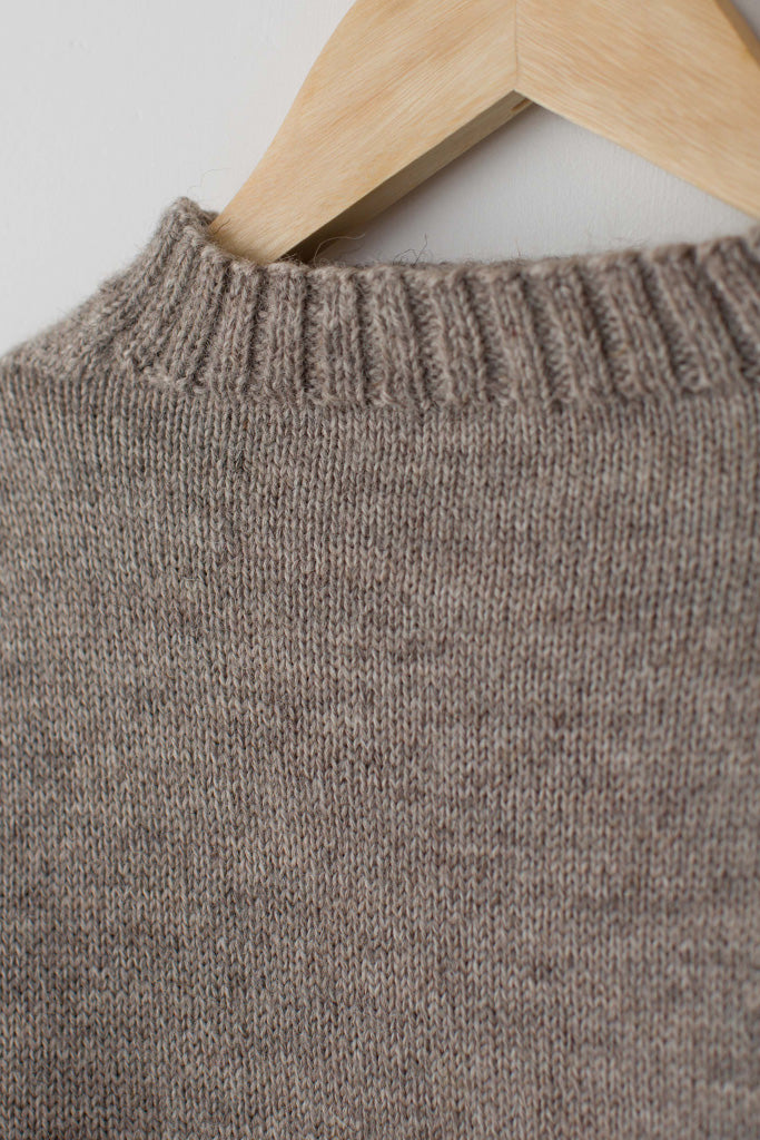 Neck detail on a Beige Traditional Guernsey